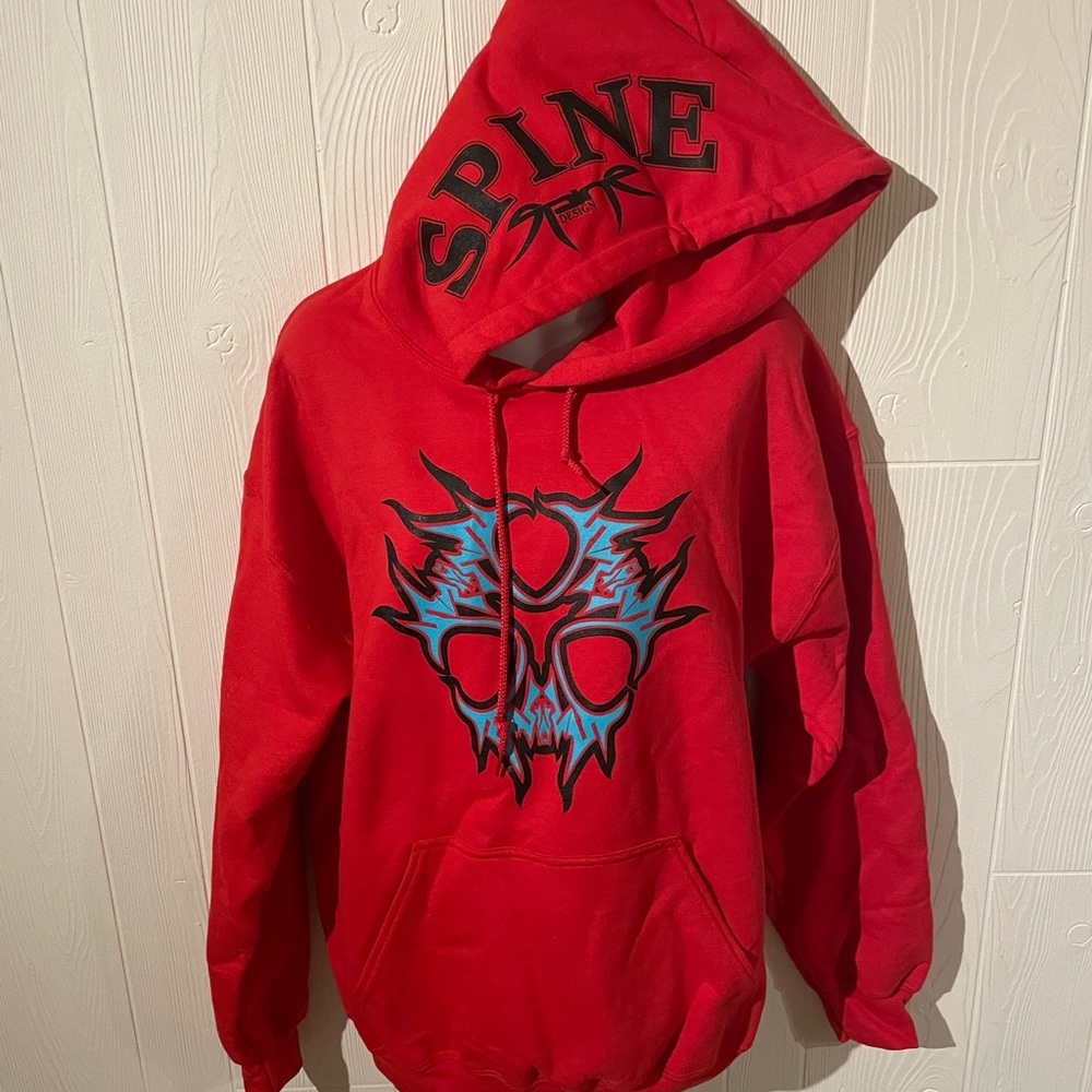 Original Spine design “Flyskull” hoodie. Super cozy & unique! NWOT!